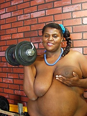 Fat ebony woman  with huge tits