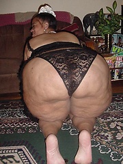 Very big black mama shows her fat ass