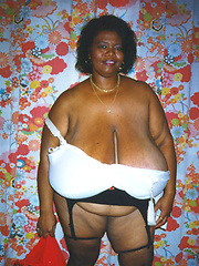 Black mamma shows her really monster tits