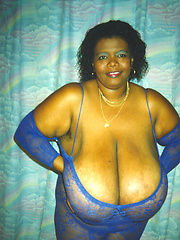 Black mamma shows her really monster tits