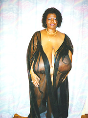 Black mamma shows her really monster tits