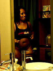 Busty black Cherokee showing her body for all