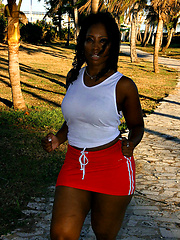 Black ass explodes out of the skirt
