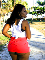 Black ass explodes out of the skirt