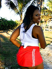 Black ass explodes out of the skirt
