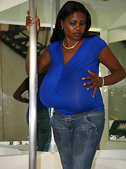 Miosotis posing near stripper pole