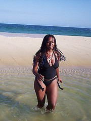Black girlfriend shows erected clit closeup