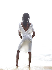 Ebony princess on the wild beach