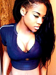 Busting out of her outfits while flaunting her cleavage